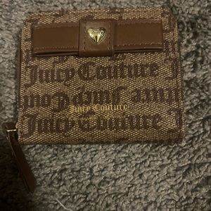 Juicy couture wallet with 2 pockets like brand new never used just removed tags